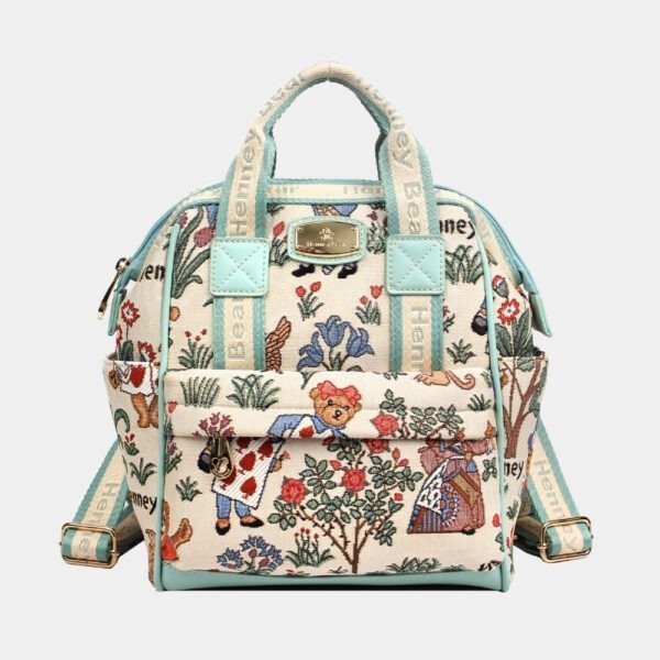 tapestry design of adorable bears, this designer compact backpack is good for day trips.